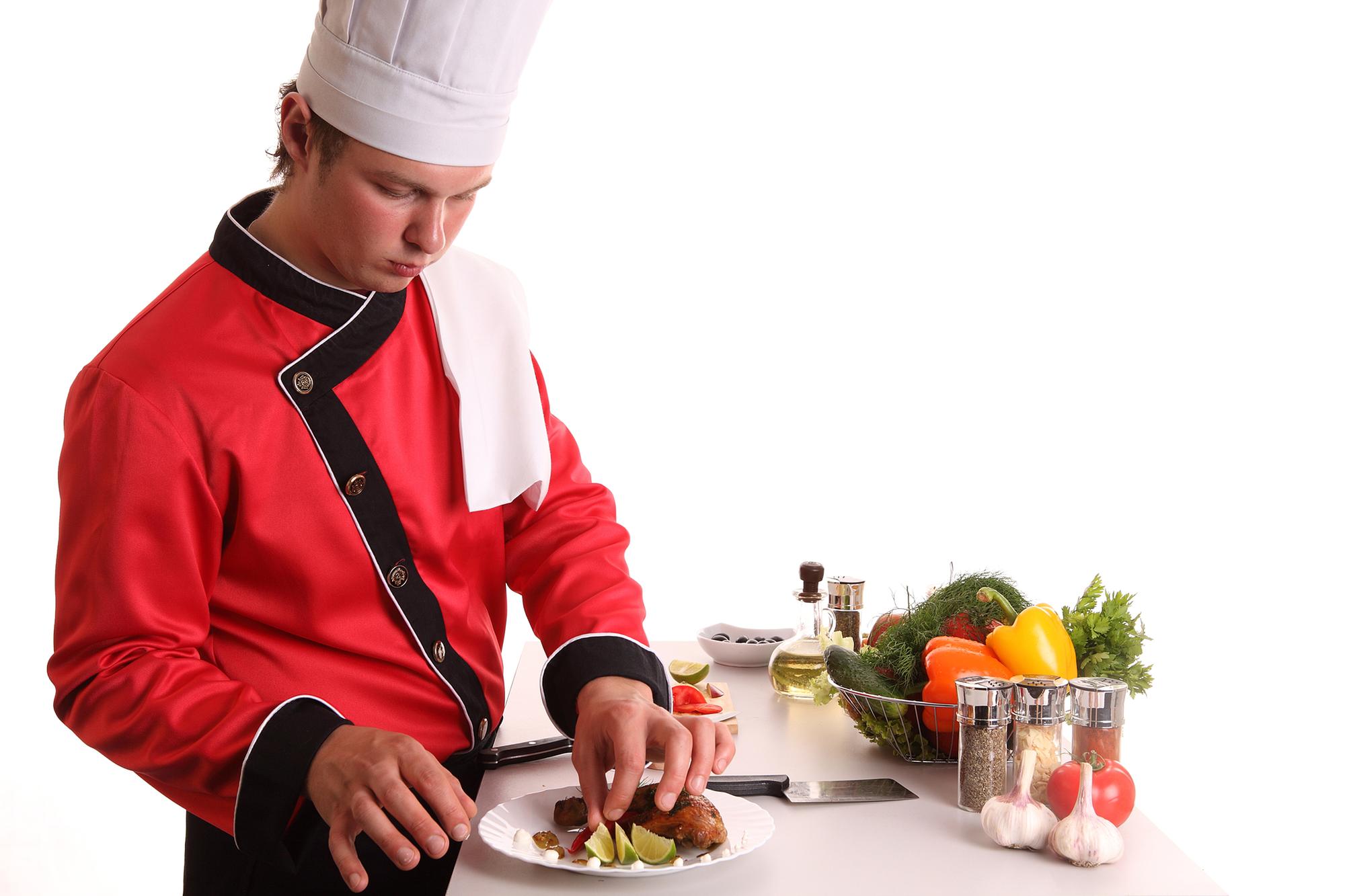 Small open kitchen with chef at work